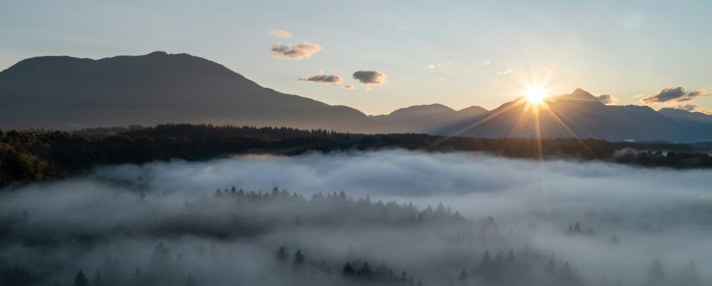 A misty valley in early morning reminds us of what God means when He says, "My name is."