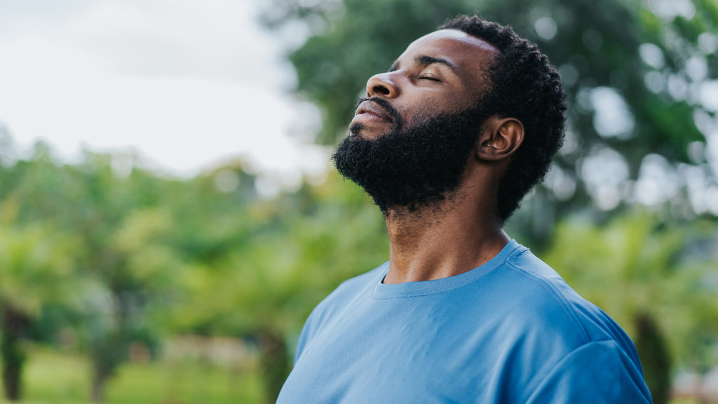 Royalty-Free Stock Photo: Man discovering inner peace in nature.