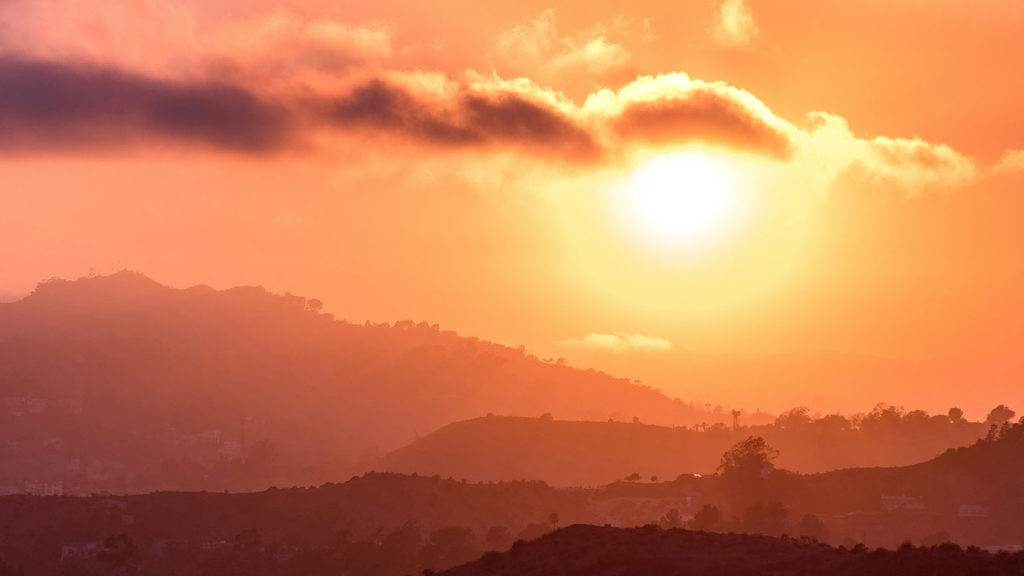 A brilliant orange sunset reminds us to stay on fire for the Lord.