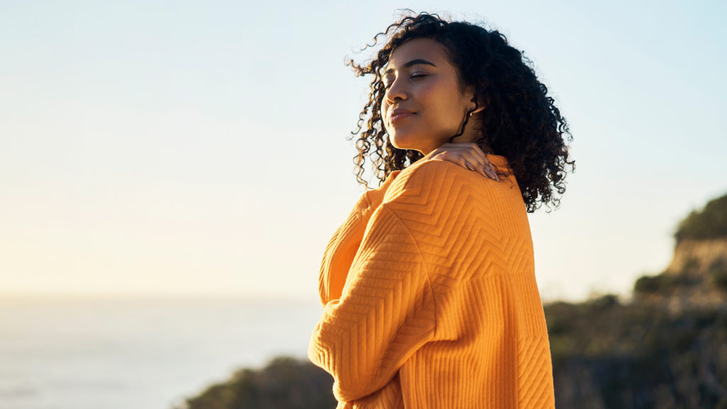 Royalty-Free Stock Photo: Young woman on a journey towards self-acceptance.