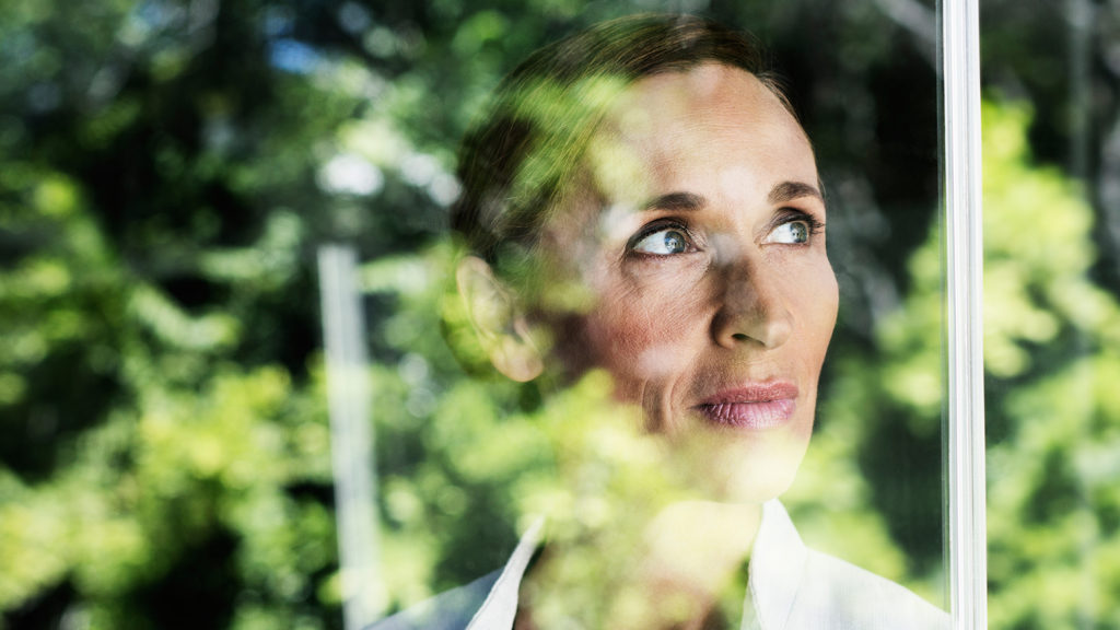 Royalty-free stock photo: A pensive woman experiences doubt; Getty Images