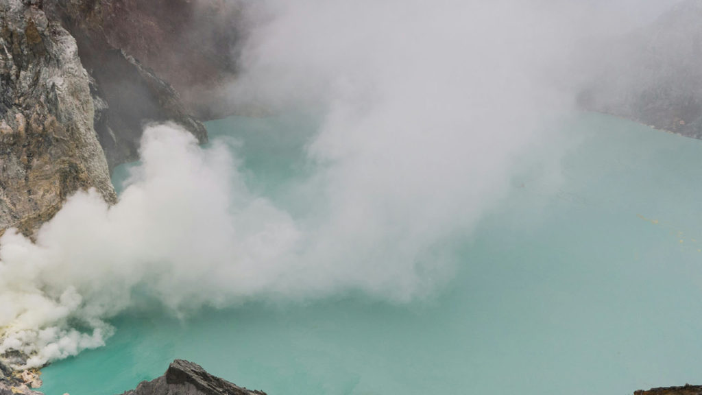 A mist over a mountain lake illustrates what it feels like to cool down anger.