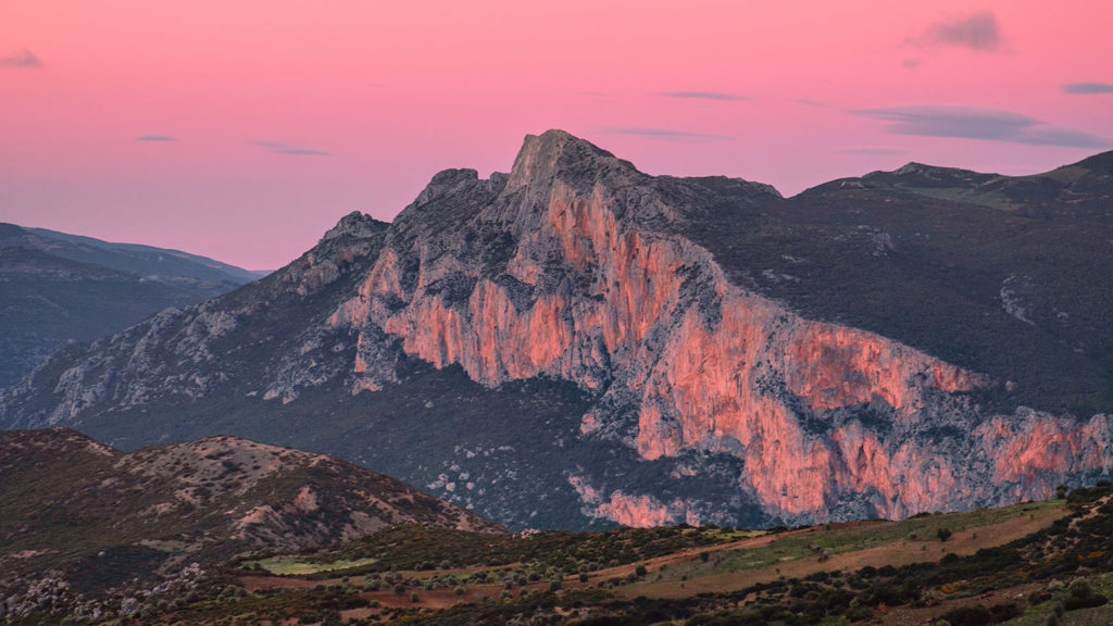 A mountain peak at sunrise shows what it can feel like when you're receiving kind correction.